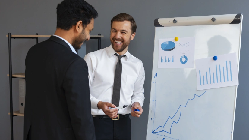 business person looking finance graphs